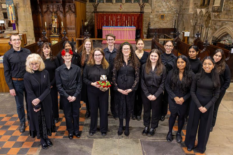 The choir standing for a picture