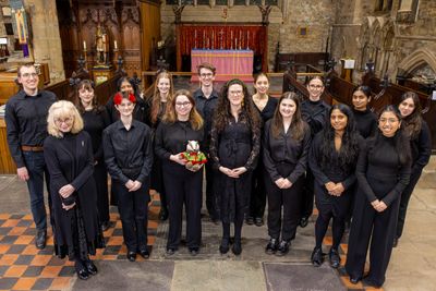 The choir standing for a picture